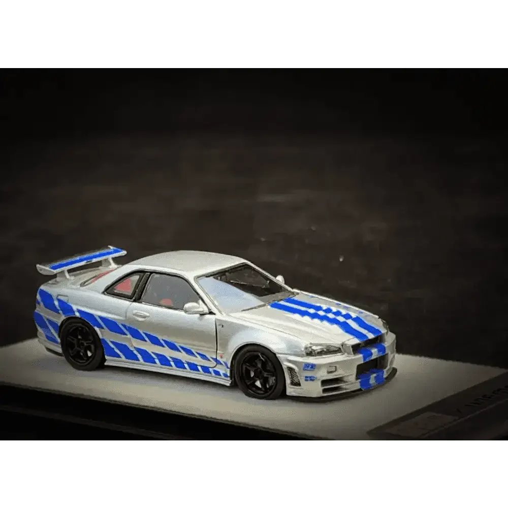 PGM 1/64 PGM Nissan Skyline GT-R R34 FNF Silver-Blue