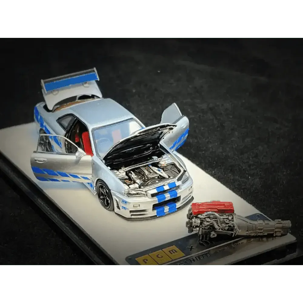 PGM 1/64 PGM Nissan Skyline GT-R R34 FNF Silver-Blue
