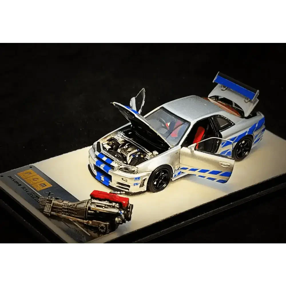 PGM 1/64 PGM Nissan Skyline GT-R R34 FNF Silver-Blue