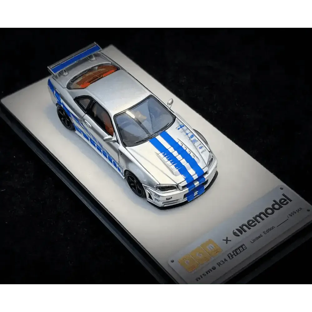PGM 1/64 PGM Nissan Skyline GT-R R34 FNF Silver-Blue