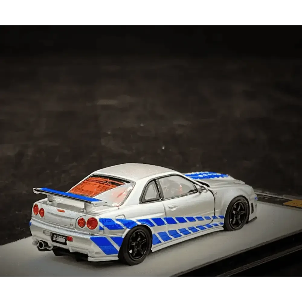 PGM 1/64 PGM Nissan Skyline GT-R R34 FNF Silver-Blue