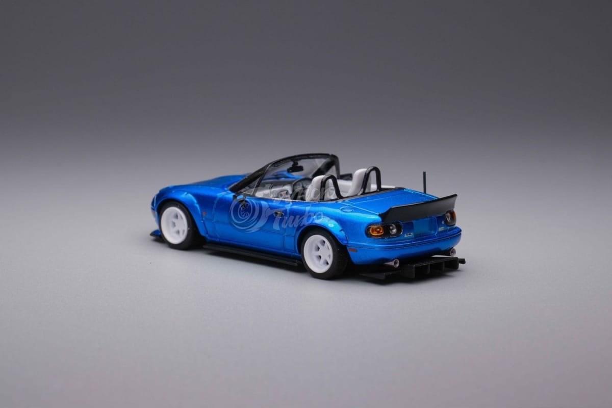 Microturbo 1/64 Pandem Rocket Bunny MX-5 Eunos Roadster (NA/Miata)
Metallic Blue Color, Retractable-Headlight