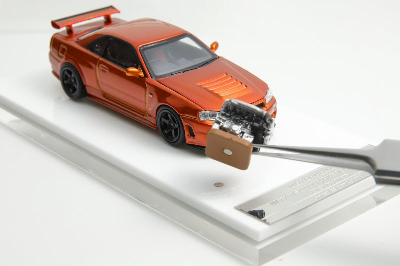 Motorhelix 1/64 Nissan Skyline GT-R, R34 Nismo Z-Tune Sunset Orange