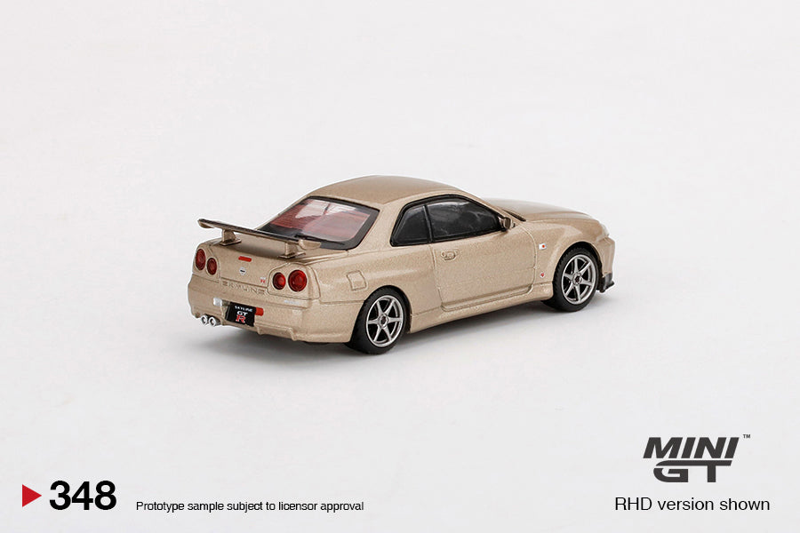 Mini GT 1/64 Nissan Skyline GT-R (R34) M-Spec Gold ***in clamshell blisters***