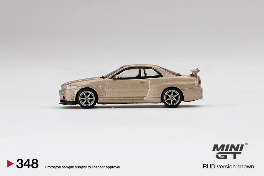 Mini GT 1/64 Nissan Skyline GT-R (R34) M-Spec Gold ***in clamshell blisters***